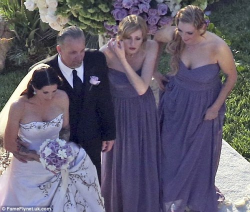 Alexis's bridesmaids wore strapless purple gowns